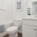 a bathroom with a tub toilet and sink