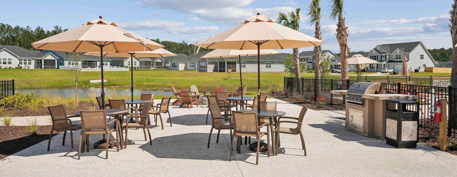 a group of tables and chairs outside