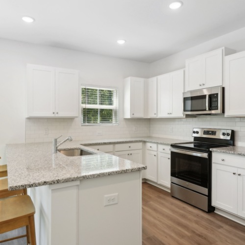 Make this place your home Well-lit kitchen with ample counter space